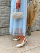 Una Healy “Escapade" Mother of Pearl Sling Backs