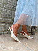 Una Healy “Escapade" Mother of Pearl Sling Backs