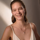 Tipperary Crystal Bow - Pearl & Bow Pendant Gold