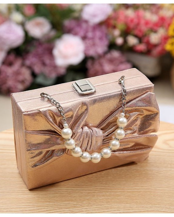 Megan Bow Clutch with Pearl Handle Rose Gold